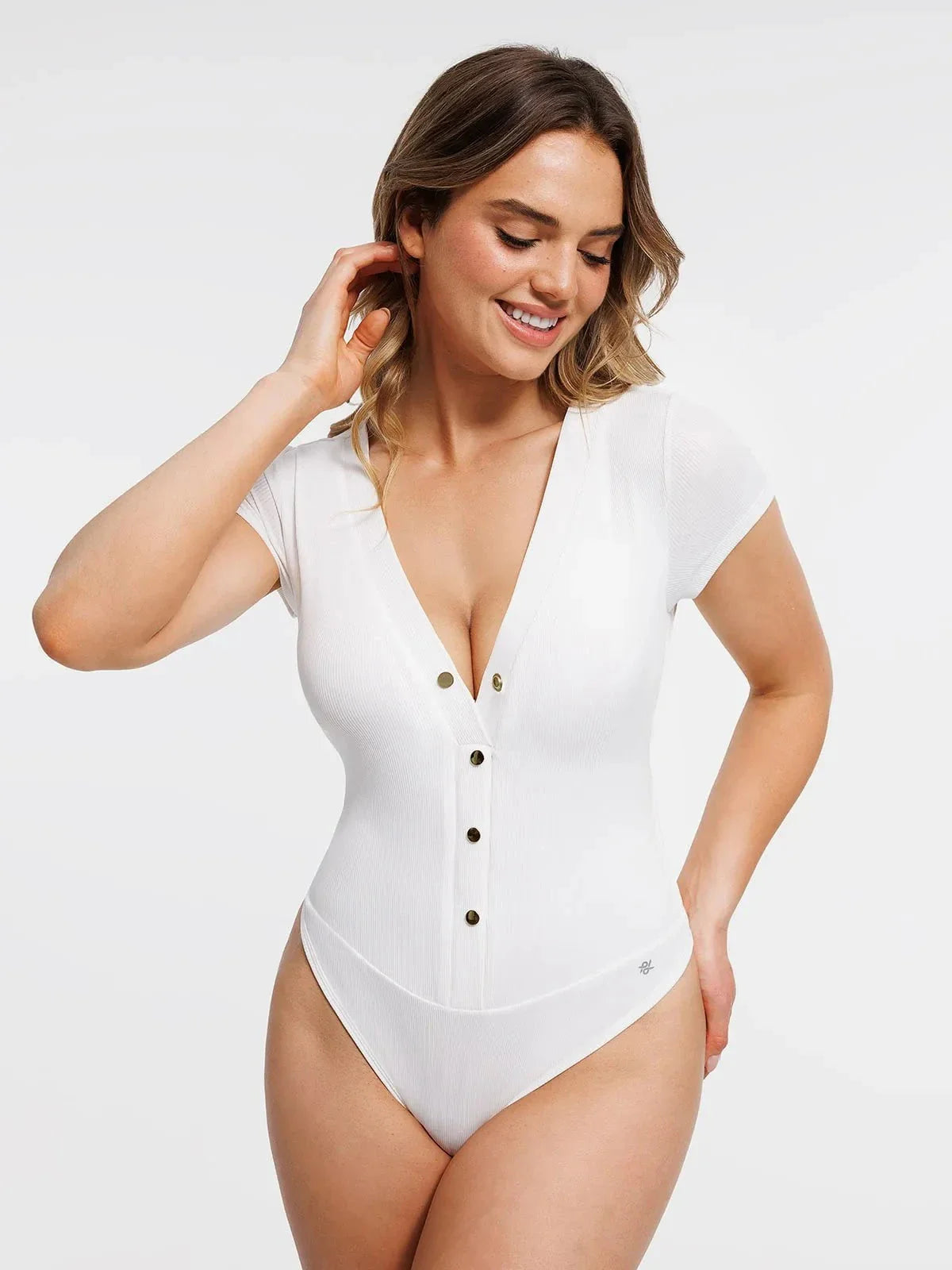 Body sculptant à décolleté en V profond et boutons à l'avant